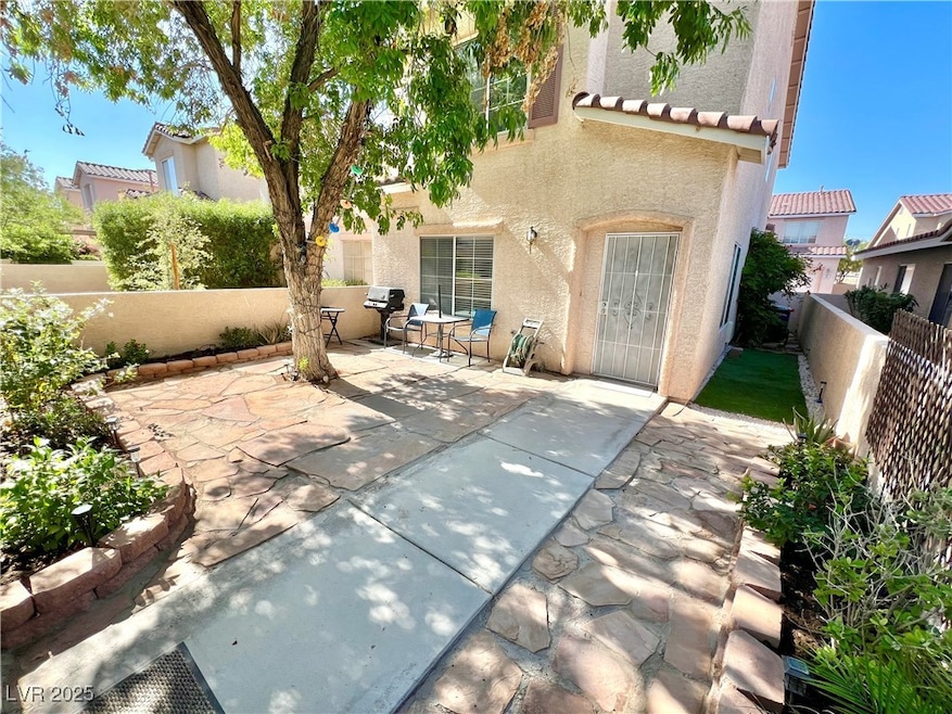 Fenced backyard featuring a patio