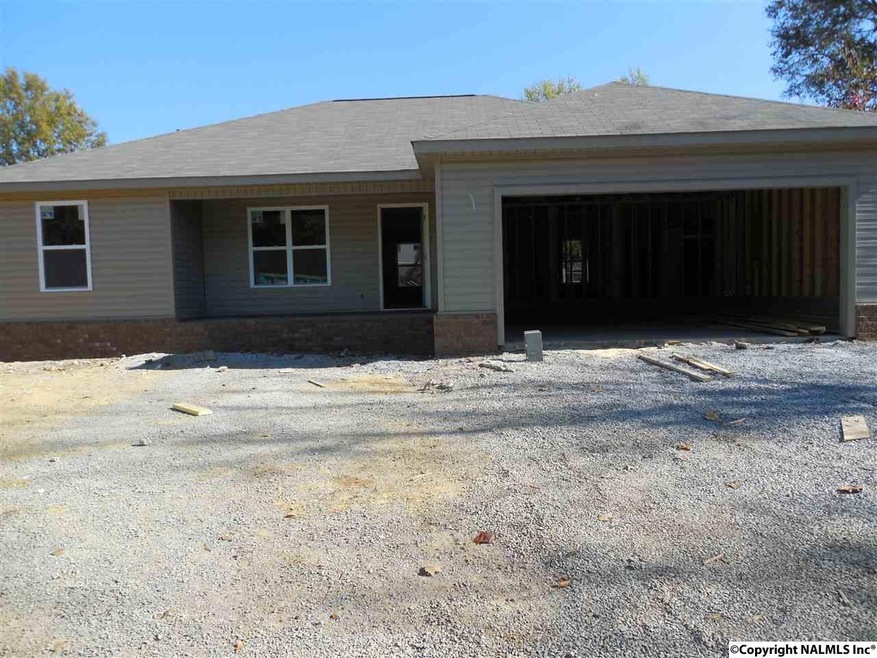 Under construction a great home situated on a corner lot. There is an open great room to the kitchen with a dine-in bar, and separate area for a breakfast table. The floor plan is split with a large master brm. Carpt, tile, and laminate wood flooring.