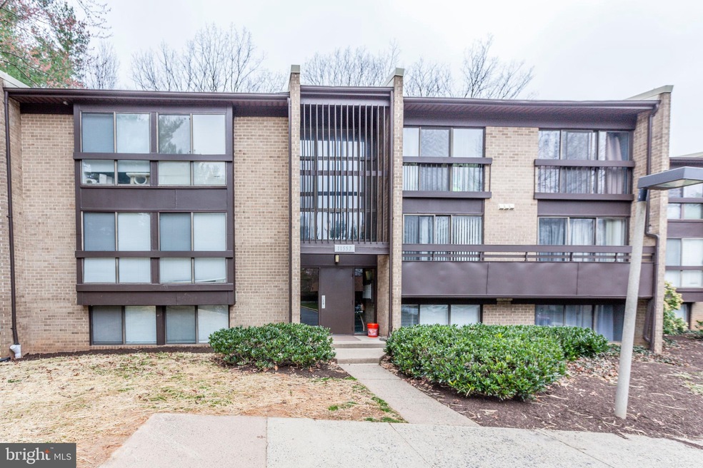 11557 Rolling Green Ct unit 201, Reston, VA 20191 - photo 1