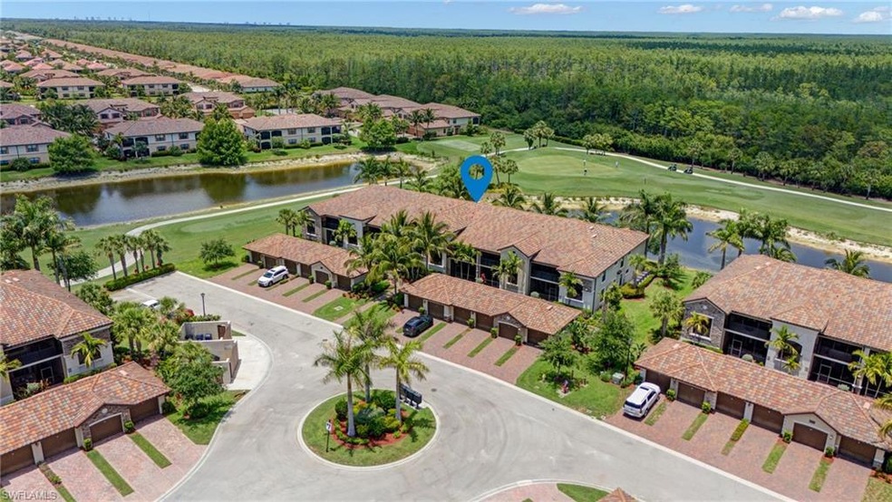 Aerial view of residential area featuring a forest