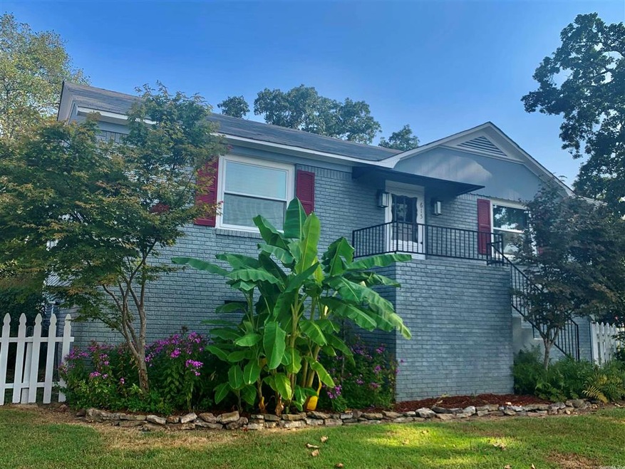 landscaped w/Banana trees, ferns, Japanese maples