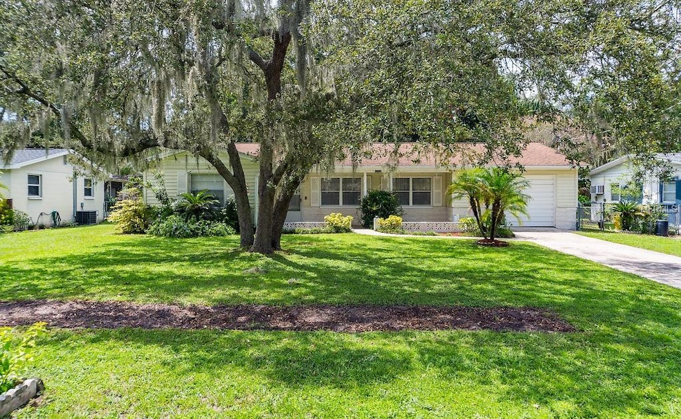Inviting curb appeal, mature landscaping.