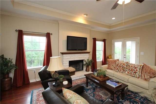 Bright Open Living room complete with fireplace an