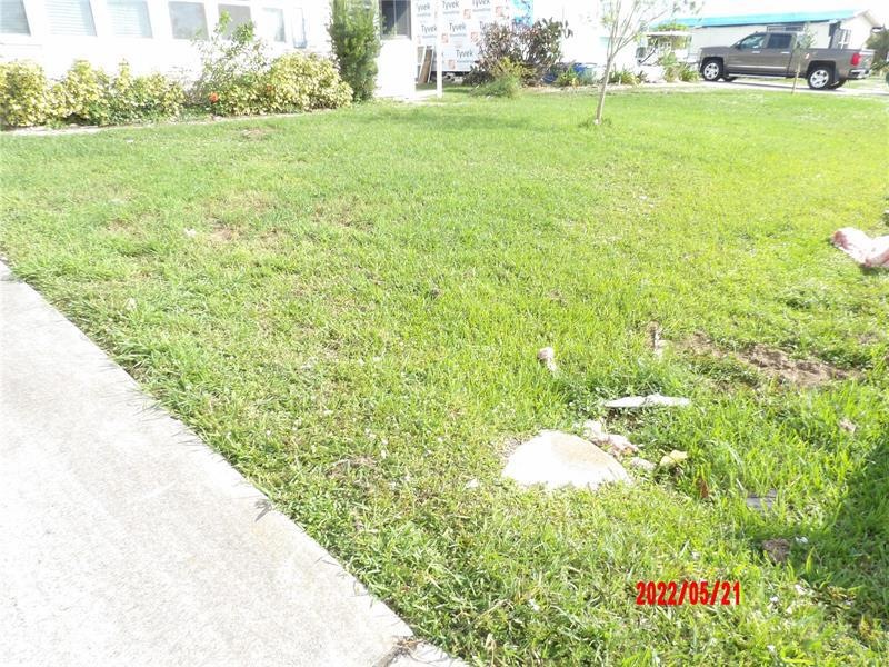 Lot with home still on it