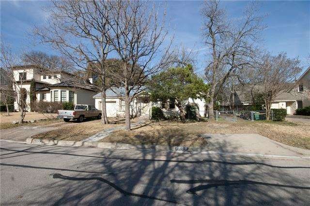 Front view of home.  Neighbors in multi million do