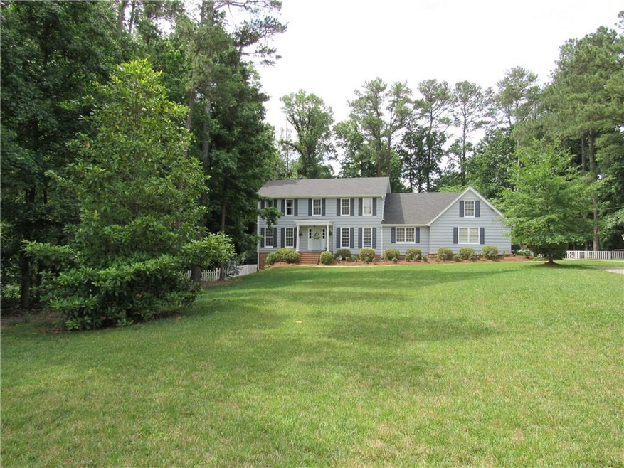 Serene setting on full Acre Fenced Lot in the hear