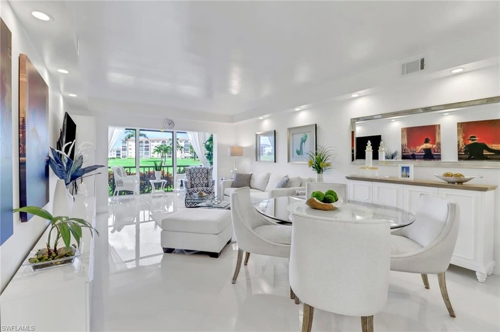 Dining and Living areas with view of the golf cour