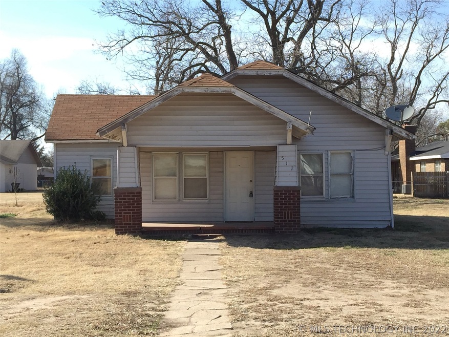 512 S Taft Ave, Okmulgee, OK 74447 - photo 1