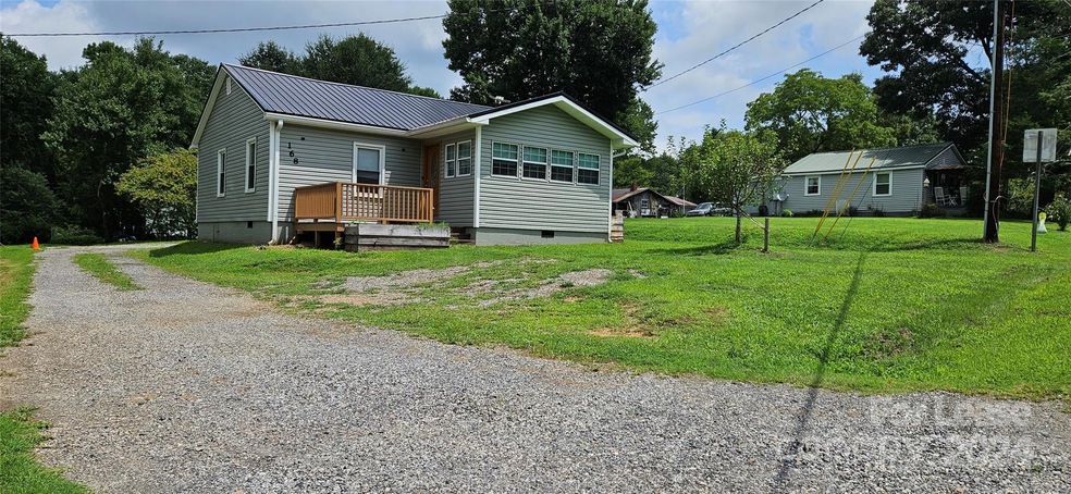 Driveway to 2 space rear parking and EV 40amp outlet