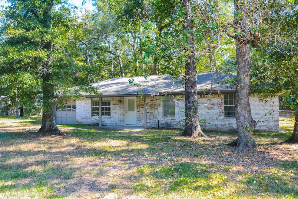 Beautiful Tree Canopies Surround this home