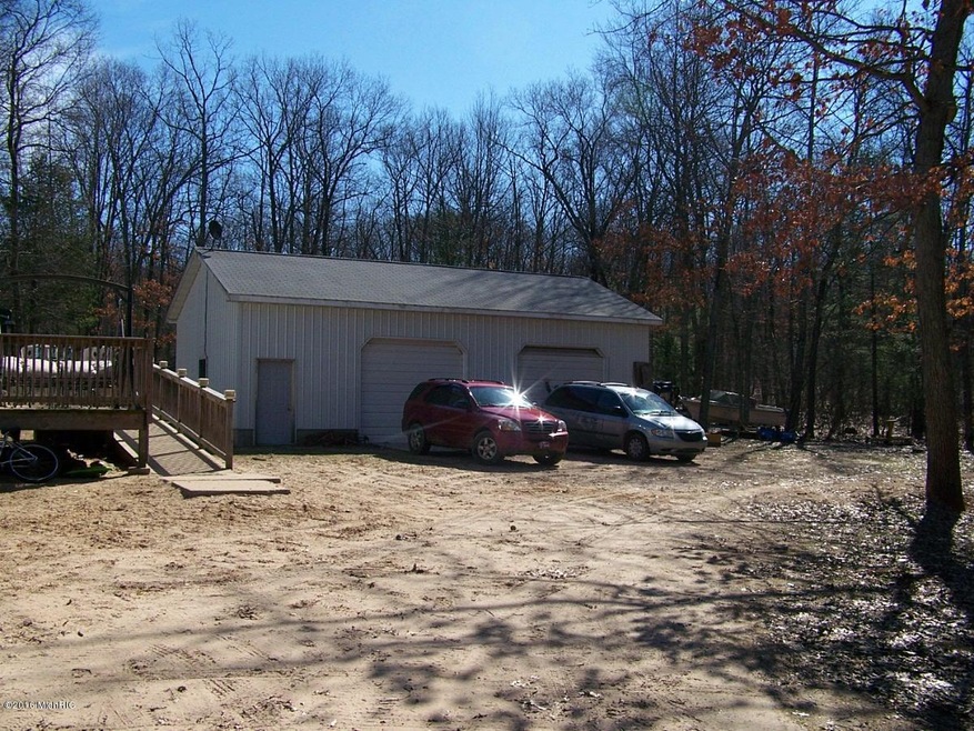 10880 N Cedar Crest Trail, Bitely, MI 49309 - photo 1