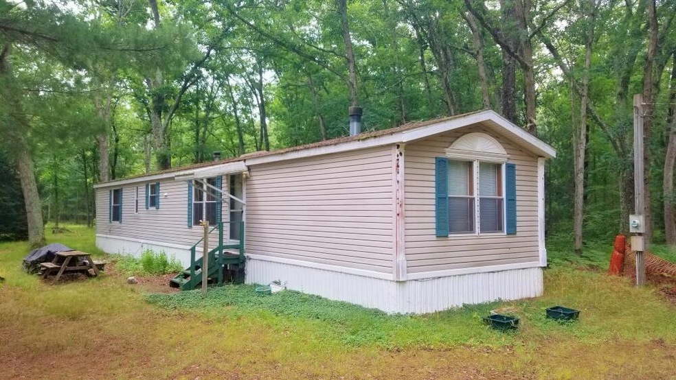 2502 W 14 Mile Rd, Bitely, MI 49309 - photo 1