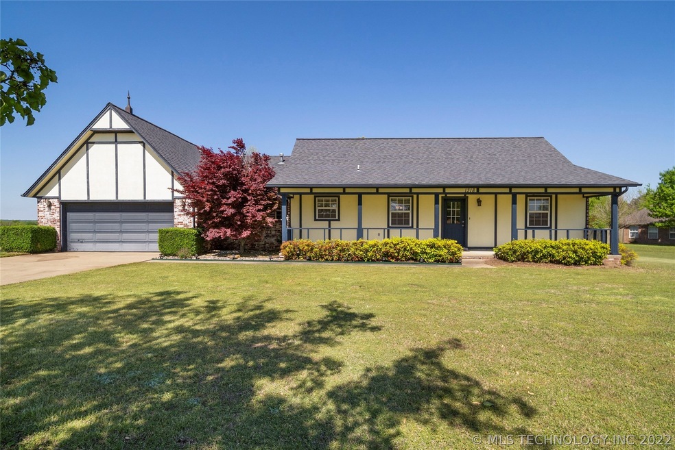 Over 1/2 acre lot, big front porch, and oversized