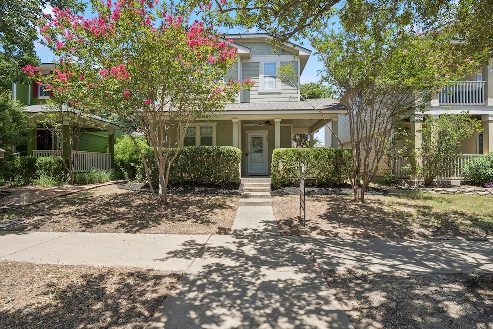 View of front of house featuring covered porch and ceiling fan