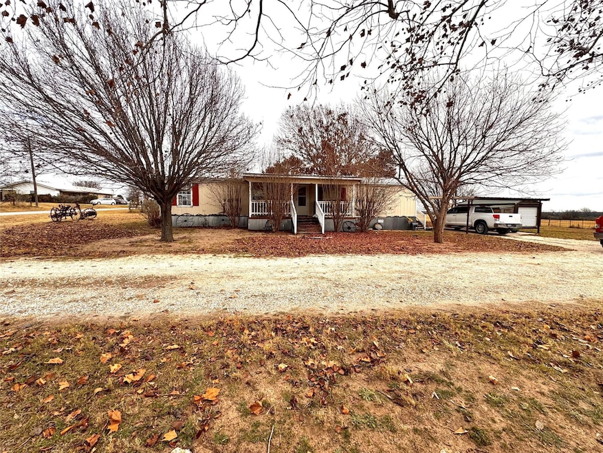 View of front of property with covered porch