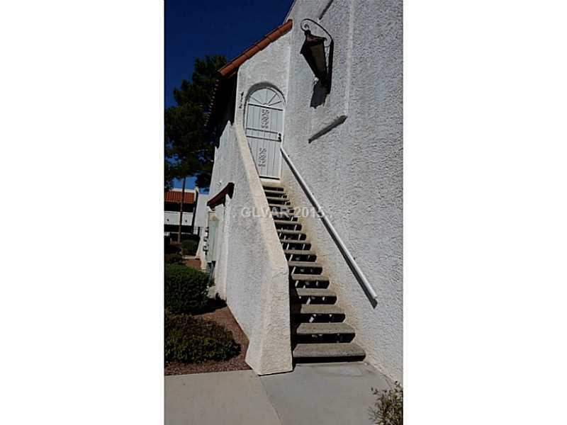 Facade/Exterior Front. Front entrance to upstairs