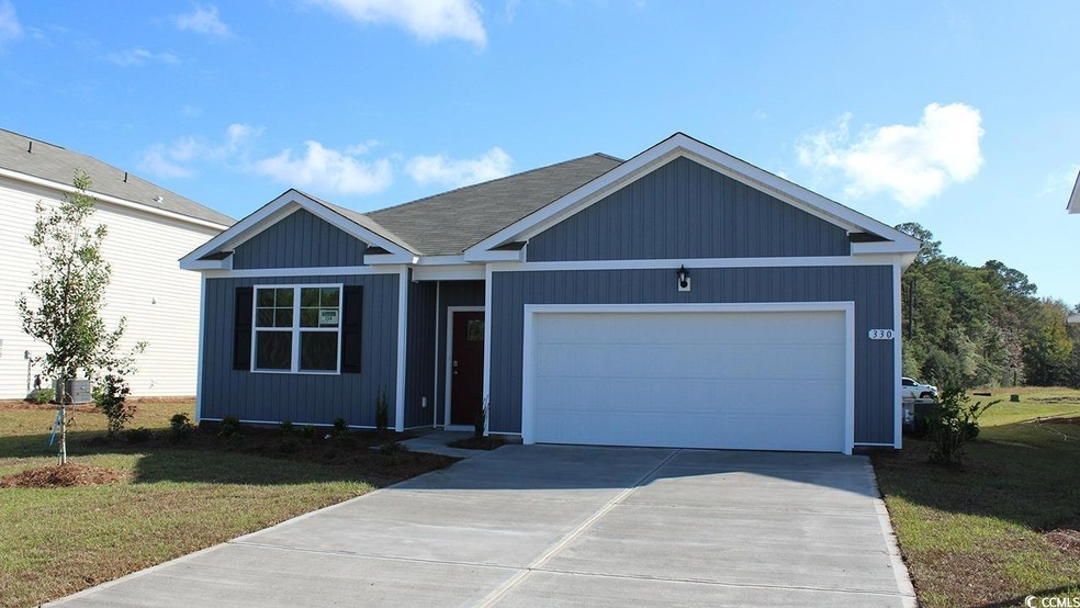 Ranch-style home featuring concrete driveway, a garage, a front lawn, and central AC