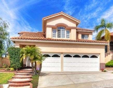 Home has beautiful curb appeal and boasts 3- car g
