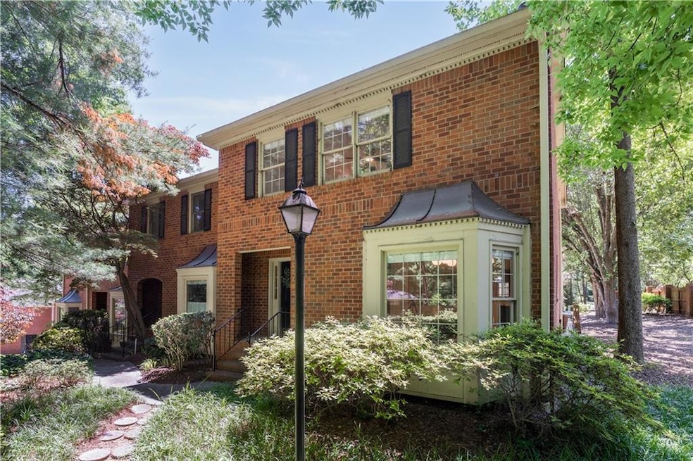 View of front facade featuring brick siding