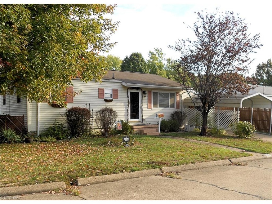 Front view of home. Also shows the carport.