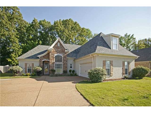 Gorgeous stone and brick 4 bedroom, 3 bath home in