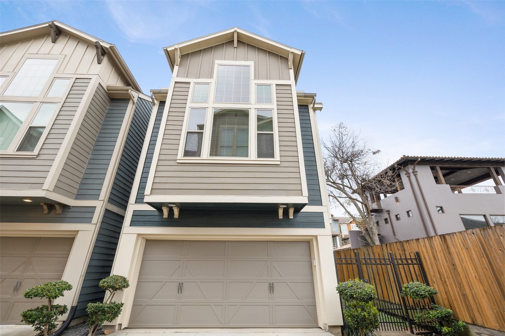 This charming, craftsman style 3-story home boasts