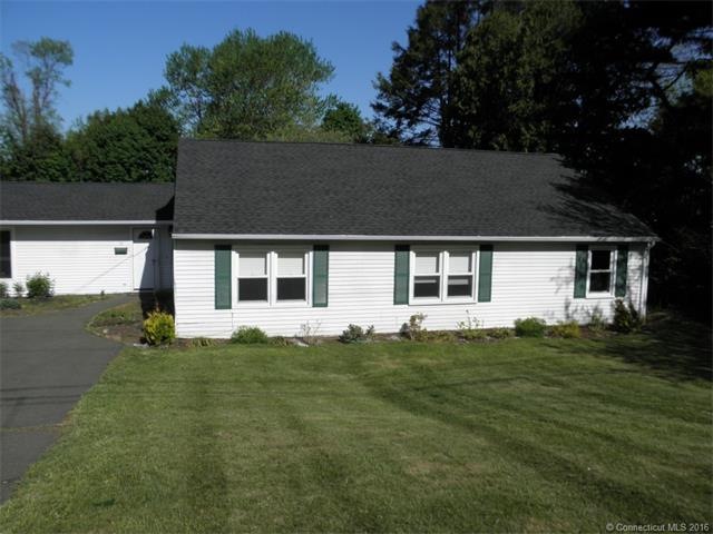 Front view of this well-maintained ranch with entr