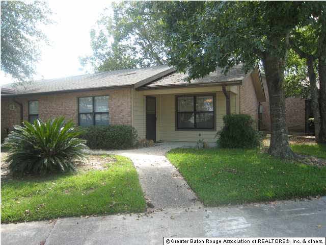CORNER UNIT ON TREE SHADED LOT.