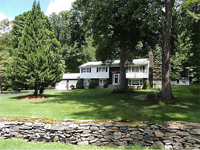 Raised Ranch on 1.3 beautiful acres in excellent l