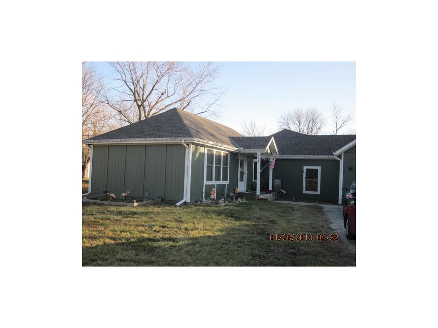 Front door with area to right the master bedroom -