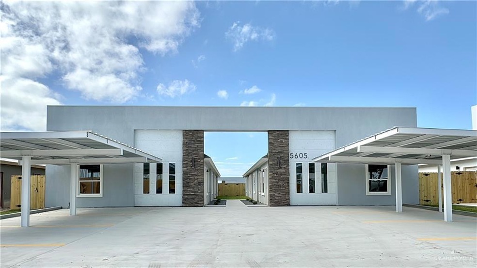 Front view with a carport