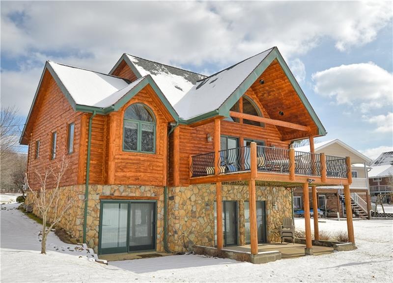 Charming 4BR log style home.  LAKEFRONT!!