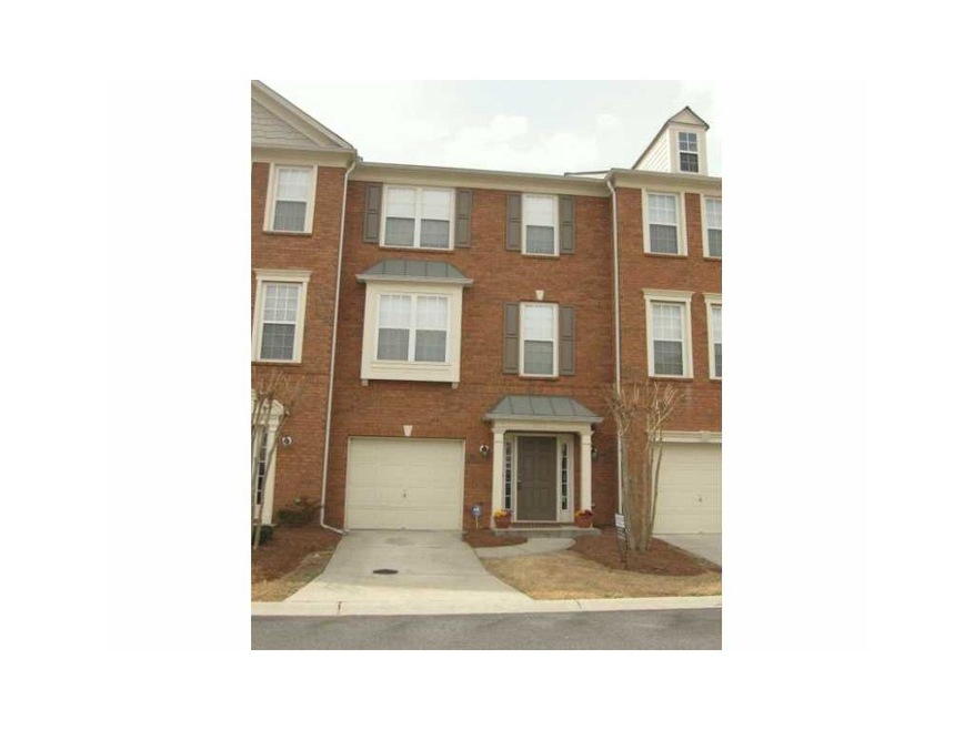 Exterior Front. Brick front townhouse