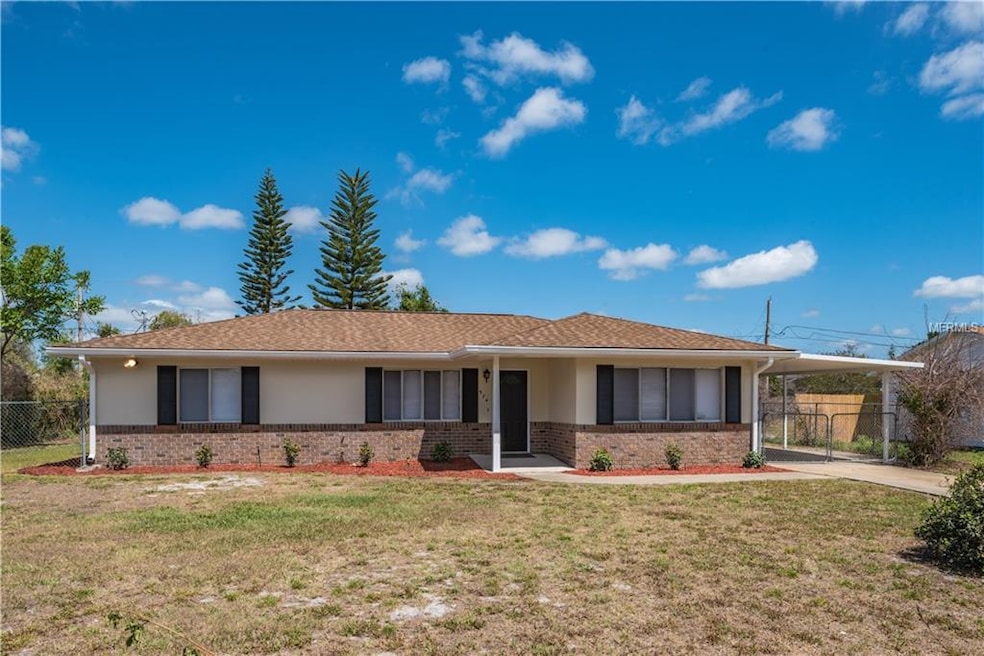 Fresh paint and brick enhance this great 3/2 home.