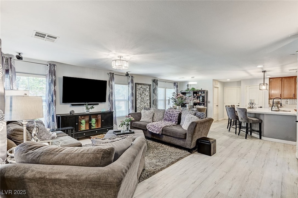 Living area featuring light wood-style flooring