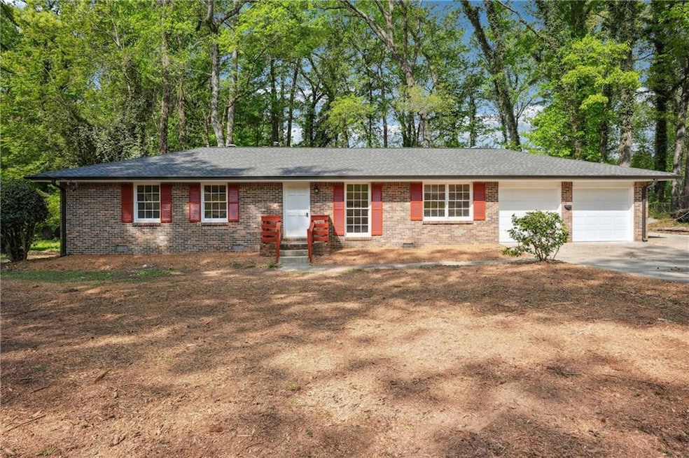 Single story home with brick siding, crawl space, 