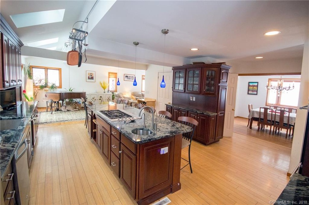 A true chef's kitchen w double ovens, 5 burner gas