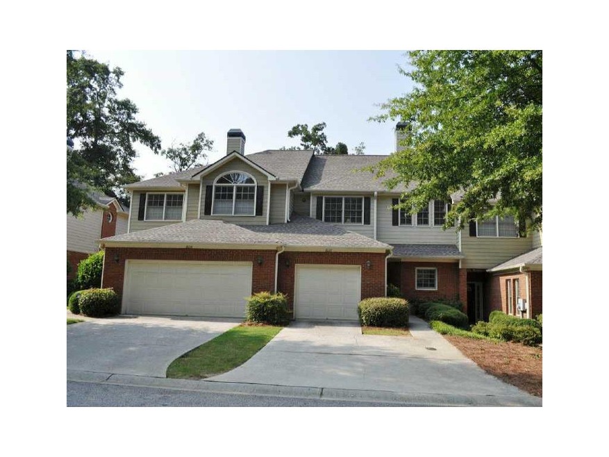Exterior Front. Newer two-story brick townhome wit