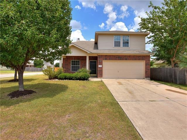 Nestled on a sprawling corner lot in the heart of 