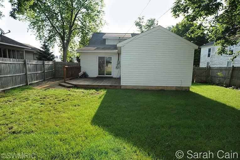 216 Maple St, Lowell, MI 49331 - photo 1