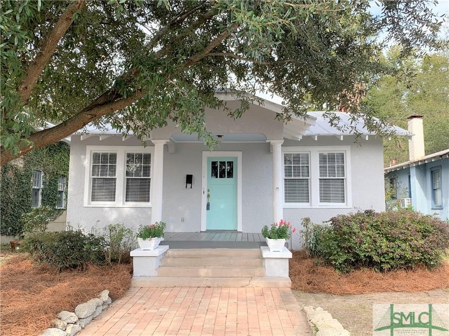 Adorable Ardsley bungalow. Brick paver walkway to 