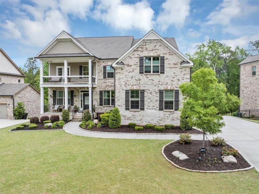 View of front of house with covered porch, concret