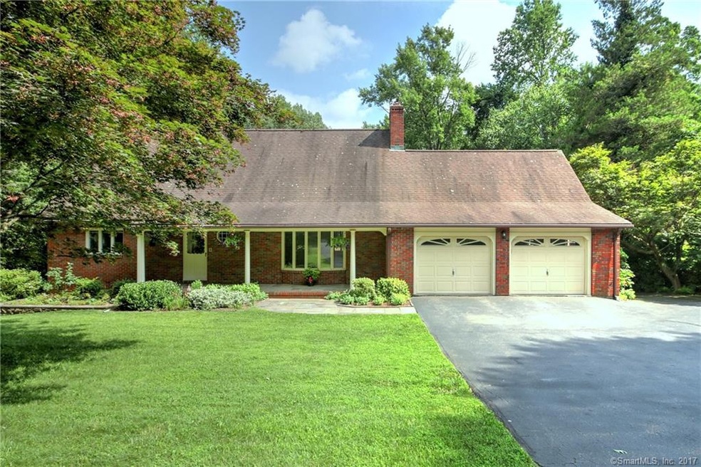 Welcome to 244 Strobel Road in Trumbull. Pinewood 
