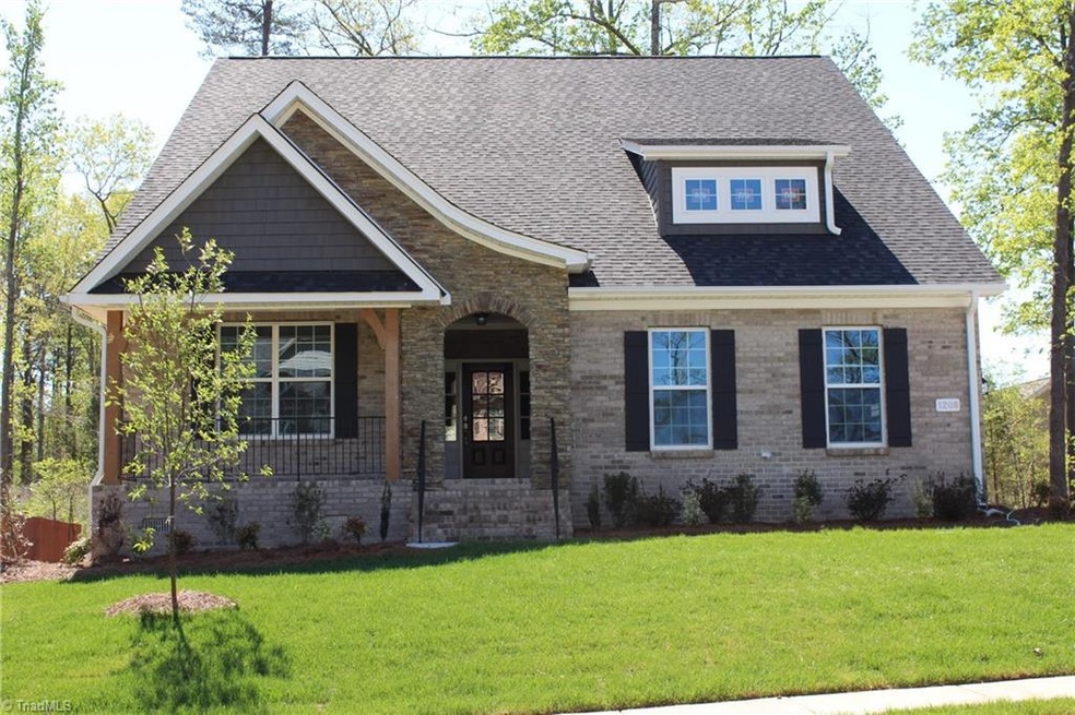 This Home Has A Lot of Character! Four Sided Brick, Color Coordinated Stone, Dormer Roofline, Wrought Iron Rails, Cedar Posts, and a Side Entry Garage!!!