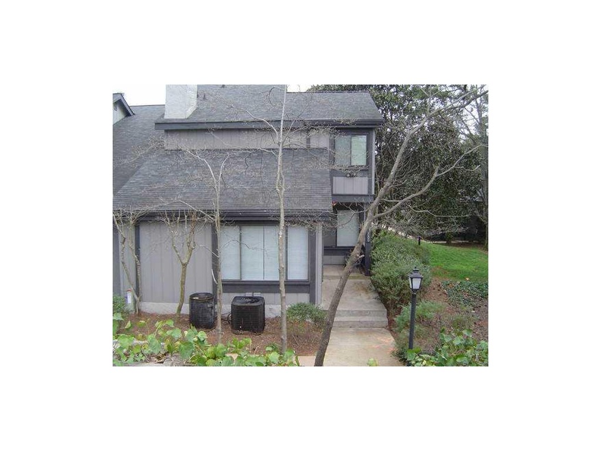 Exterior Front. End unit townhome with green space
