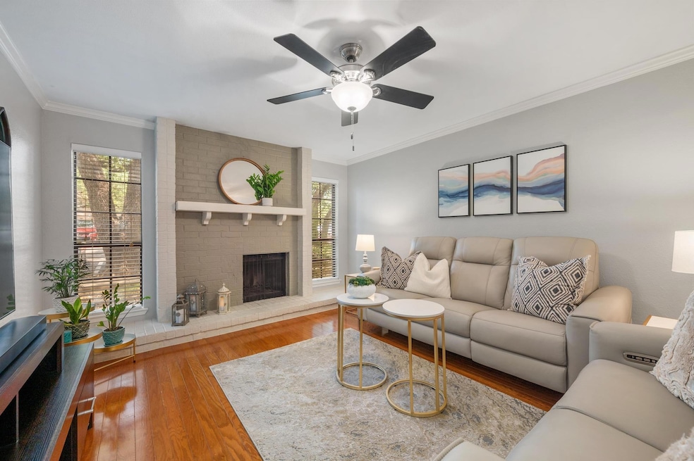 Living room with wood finished floors, healthy am