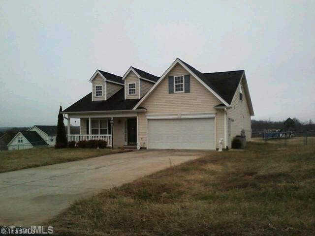 Exterior Front. Great potential in desirable King area home.