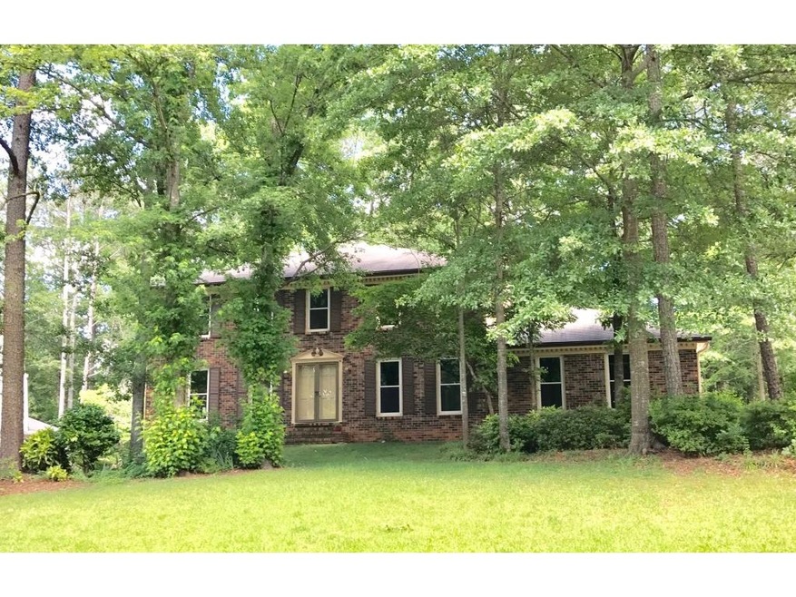 Welcome Home!  This 3-sided brick traditional has 