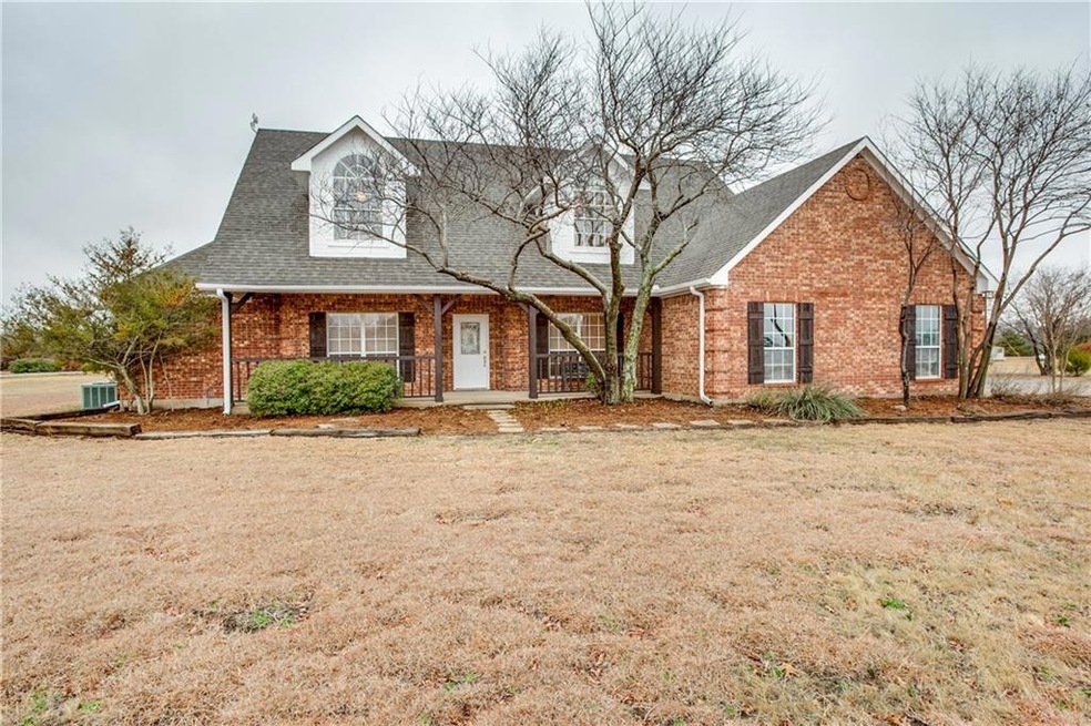 Beautiful drive up appeal with large front porch