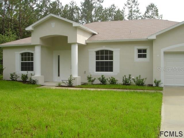 48 Llama Trail, Palm Coast, FL 32164 - photo 1